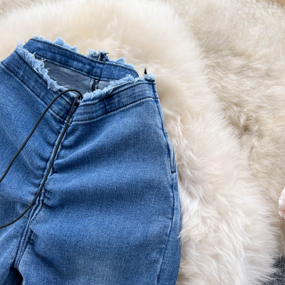 Jeans im koreanischen Stil mit Pelzbesatz und ausgestelltem Bein
