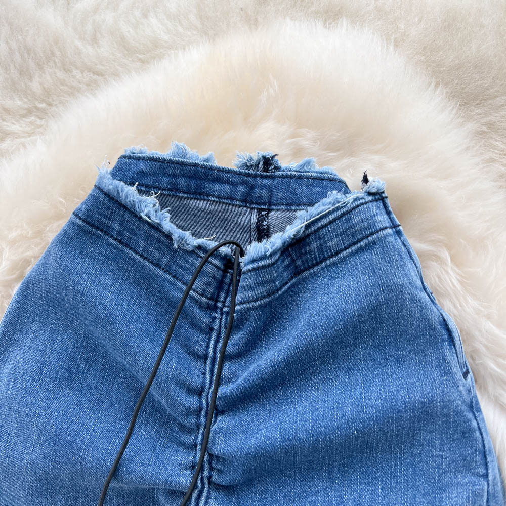 Jeans im koreanischen Stil mit Pelzbesatz und ausgestelltem Bein