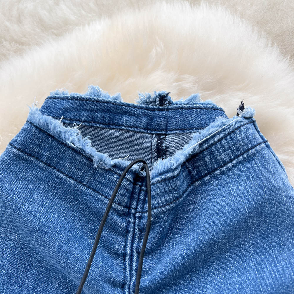 Jeans im koreanischen Stil mit Pelzbesatz und ausgestelltem Bein